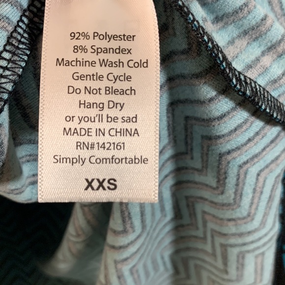 LULAROE Irma Turquoise Wicked Design Top NWT - Picture 11 of 11